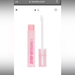 NIB babe glow plumping lip jelly clear